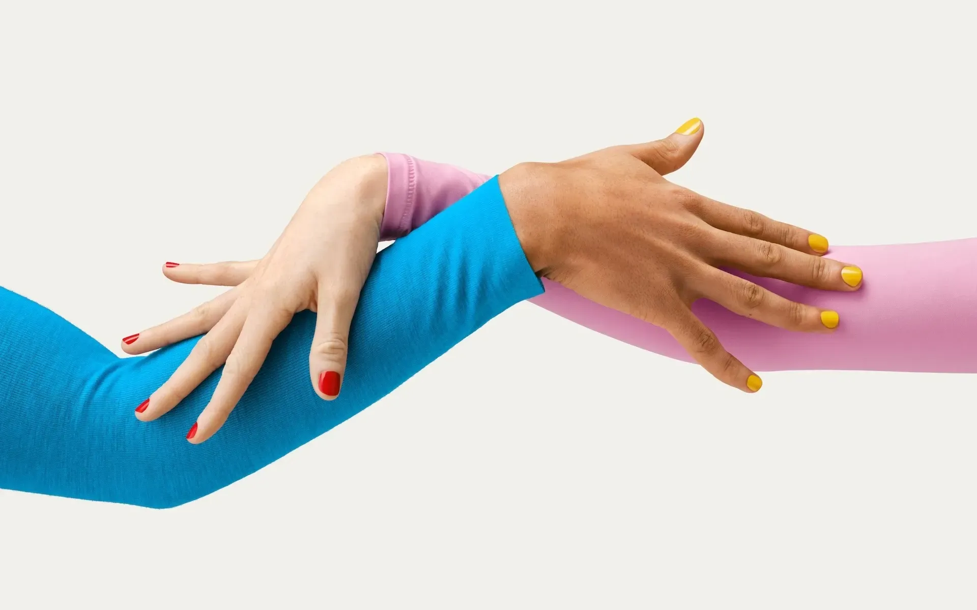 Two hands linking together 