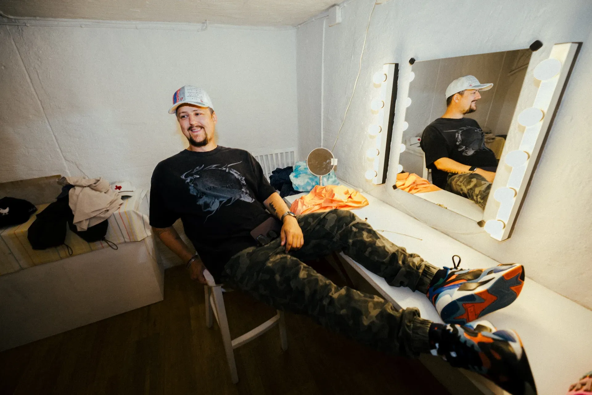 Lukas Got Lucky sitting in a dressing room