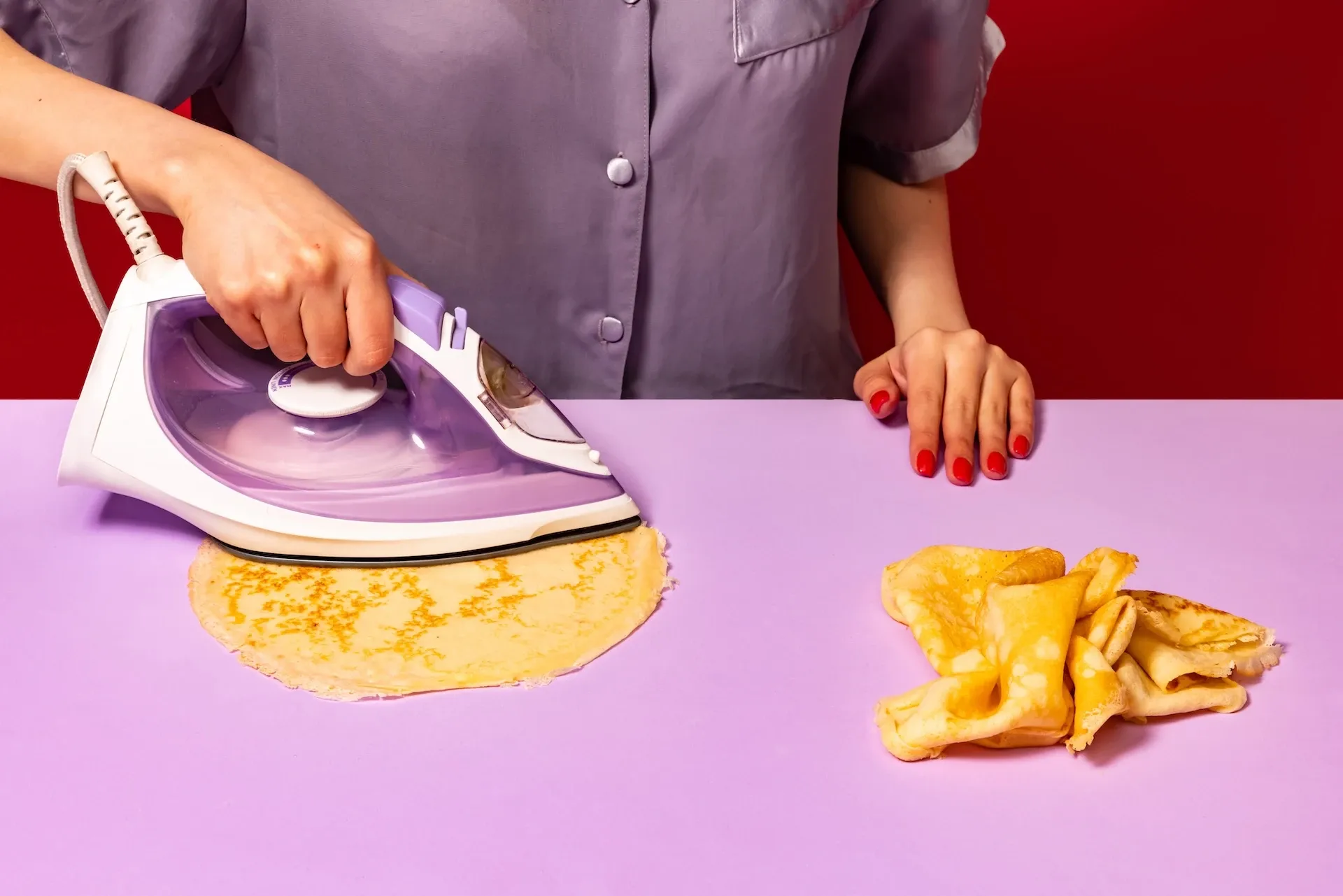 Woman ironing pancakes
